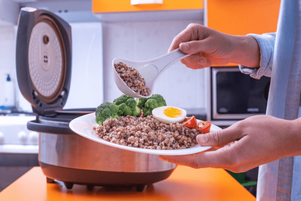 Are multi-cookers worth it – modern multi-cooker on kitchen counter with ingredients